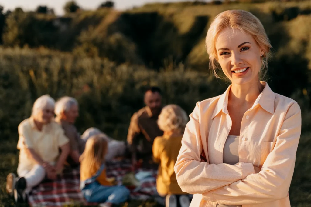 medium shot smiley woman with crossed arms